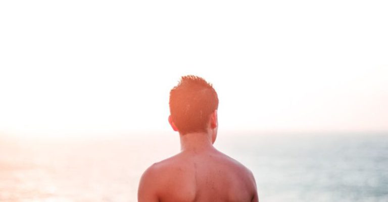 Costa Rica - Topless Man Standing At Seashore