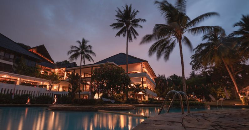 Hotel - Palm Trees at Night