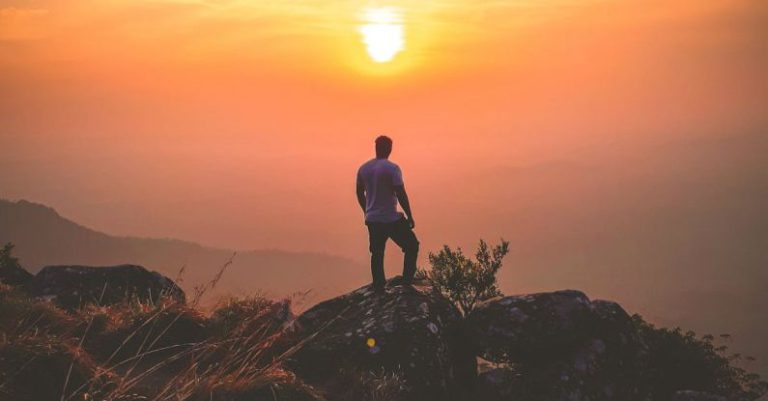 Adventure - Man Standing on Rock During Sunset