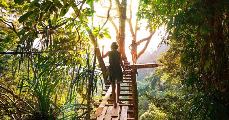 Adventure - Woman Crossing on Bridge