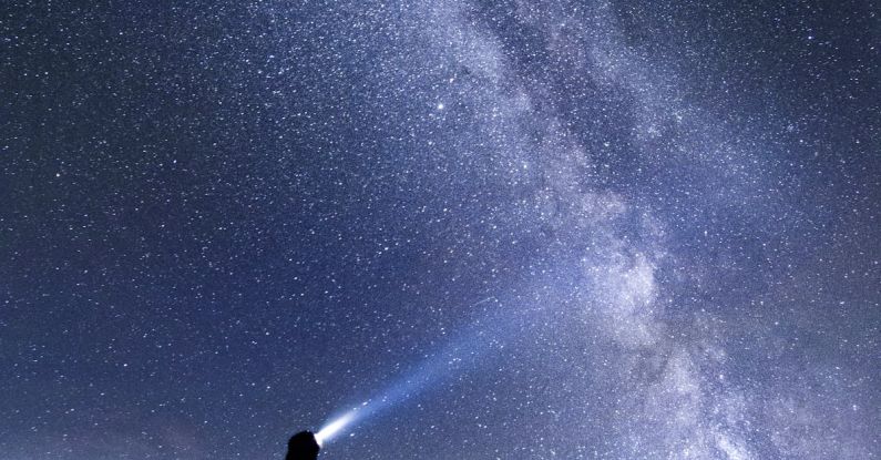 Adventure - Silhouette of Man Standing on Mountain during Night