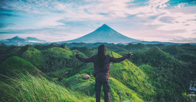 Adventure - Person Standing on Top Of Hill