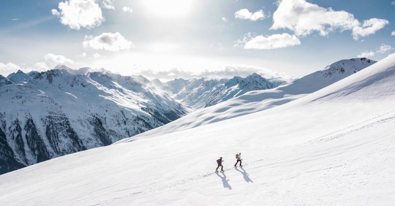 Adventure - Two Man Hiking on Snow Mountain