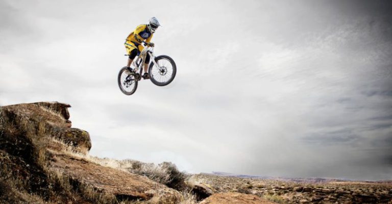 Adventure - Person Riding Bike Making Trek on Thin Air