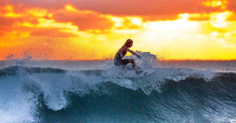 Surfing - Man Surfing on Waves